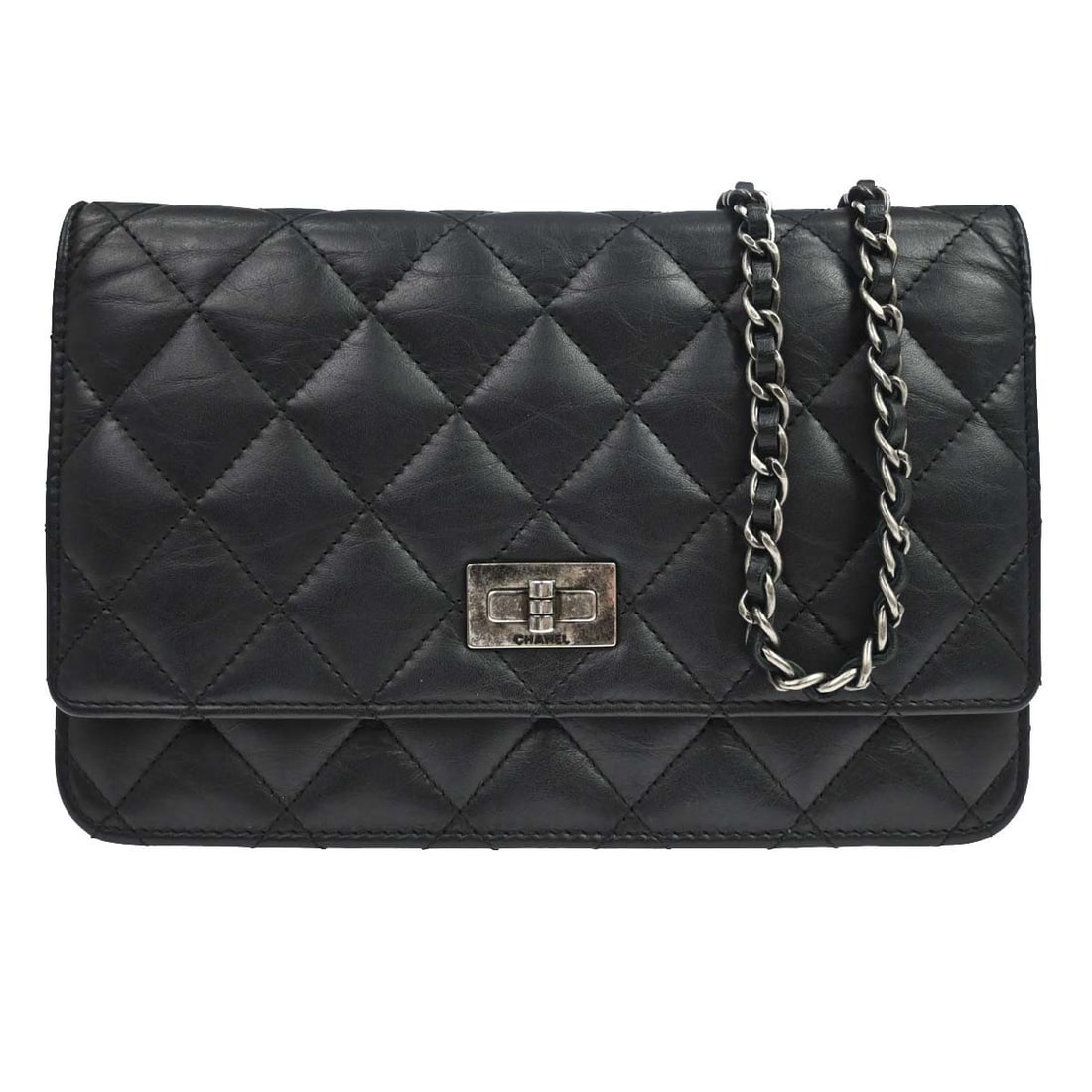 CHANEL 2.55 Reissue Wallet on Chain in Black Calfskin: CHANEL 2.55 Reissue Wallet on Chain in Black Calfskin Chanel 2.55 Reissue WOC wallet on chain bag in black aged calfskin leather. This folding wallet style features an exterior pocket and a well-organ