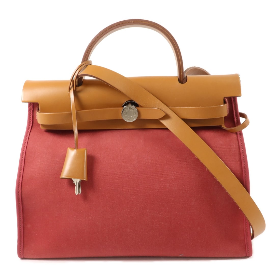 HERMES Herbag PM canvas 2 way shoulder bag Rubis Fauve: HERMES Herbag PM canvas 2 way shoulder bag Rubis Fauve Hermes Herbag PM 2-way shoulder handbag in canvas with Rubis and Fauve coloring. This women's bag features a structured design with top handles a