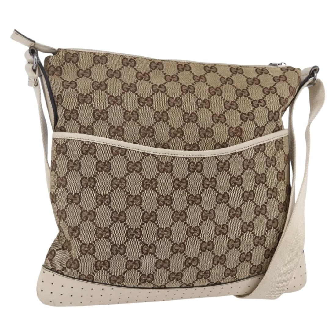 Beige GG Canvas Gucci Zip Messenger Shoulder Bag with Perforated Leather: Beige GG Canvas Gucci Zip Messenger Shoulder Bag with Perforated Leather This is a pre-owned Gucci Zip Messenger Bag crafted from GG canvas with perforated leather accents. Designed for women, it feat