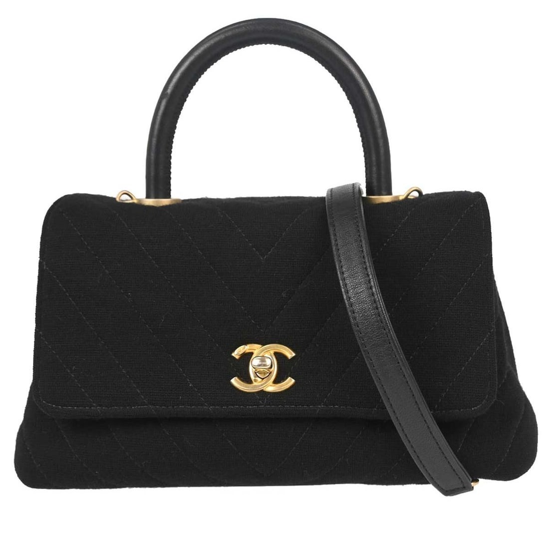 CHANEL Coco Handle Medium Black Cotton 2way Top Handle Bag: CHANEL Coco Handle Medium Black Cotton 2way Top Handle Bag Chanel Coco Handle 2way handbag in black cotton with chevron detailing. This women's top handle bag features a turn lock closure, logo accent