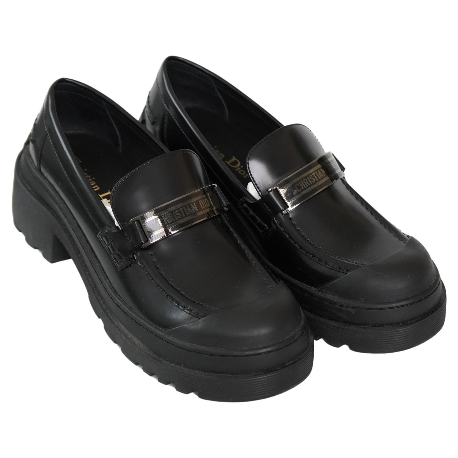 Christian Dior Code slip on black loafer EU 38: Christian Dior Code slip on black loafer EU 38 Christian Dior Code black loafer in marked size 38 (EU). This slip-on shoe is described as being in excellent condition and features a 3.5 cm heel height