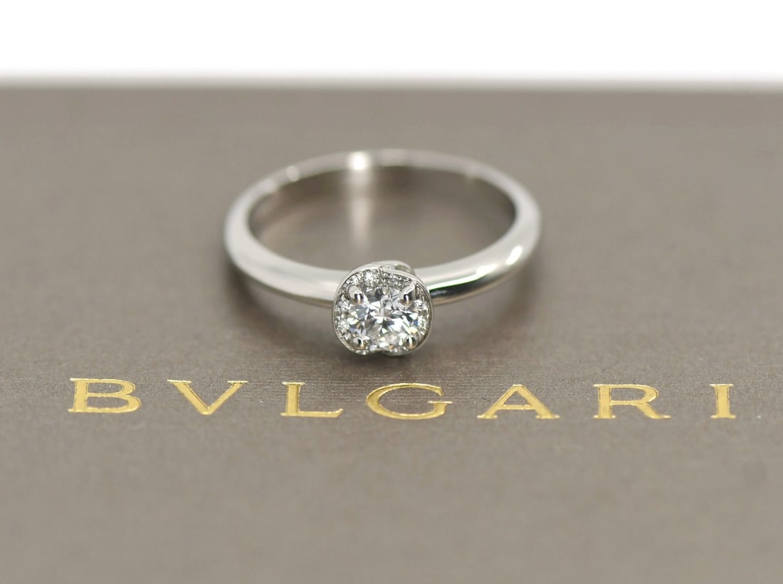 Platinum Diamond Engagement Ring by Bulgari GIA Certified Size 4: Platinum Diamond Engagement Ring by Bulgari GIA Certified Size 4 This Bulgari engagement ring features a 0.21 carat round diamond with D color and VVS2 clarity, set in 950 platinum. The diamond is nat