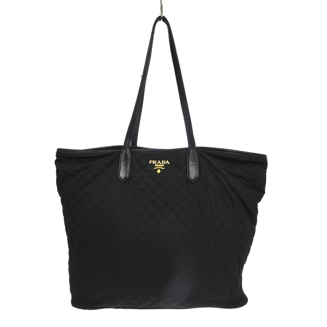 PRADA 204 Large Black Nylon Tote Bag Made in Italy: PRADA 204 Large Black Nylon Tote Bag Made in Italy Vintage Prada tote handbag in black nylon with leather trim and logo accents. This large women's bag features a casual tote silhouette with a canvas 