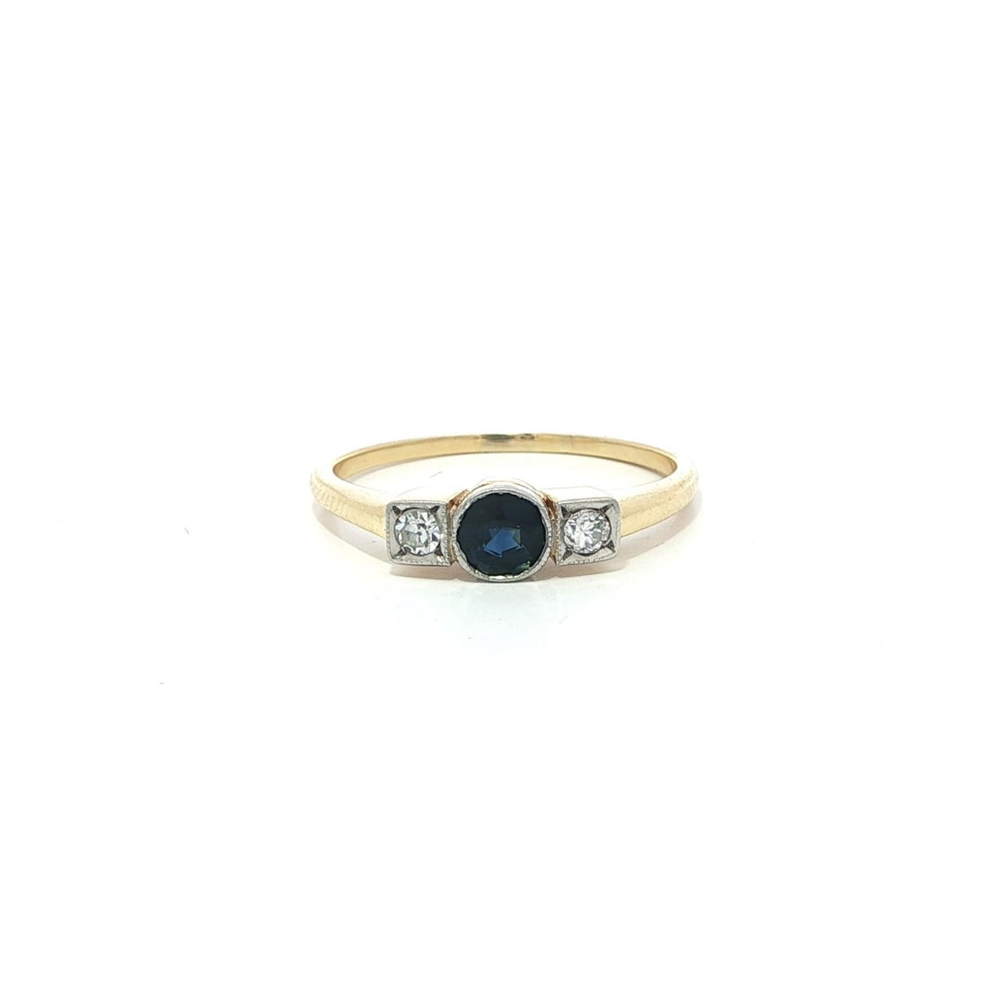 Antique 18k Yellow Gold Platinum Sapphire Diamond 3 Stone Ring: Antique 18k Yellow Gold Platinum Sapphire Diamond 3 Stone Ring This exquisite antique ring features a stunning combination of yellow gold and platinum, showcasing a bezel set sapphire and two brillian