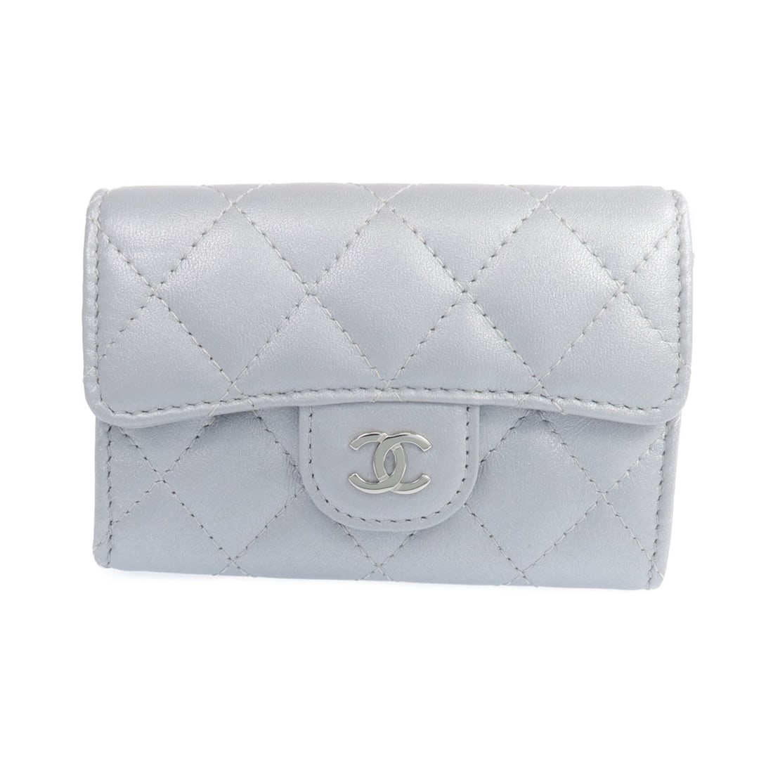 CHANEL CC Lambskin Card Case Silver SHW: CHANEL CC Lambskin Card Case Silver SHW CHANEL card case in silver lambskin (sheep leather) with a silver frame color. It is a unisex regular-size style made in France and comes with a storage box and