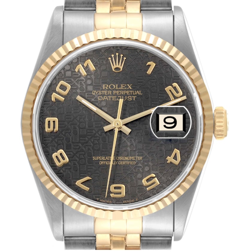 Rolex Datejust 16233 mens watch black anniversary dial papers 1995: Rolex Datejust 16233 mens watch black anniversary dial papers 1995 Rolex Datejust reference 16233 with a black Anniversary dial, fluted bezel, and 2-tone Jubilee D-Link bracelet. This men's watch incl