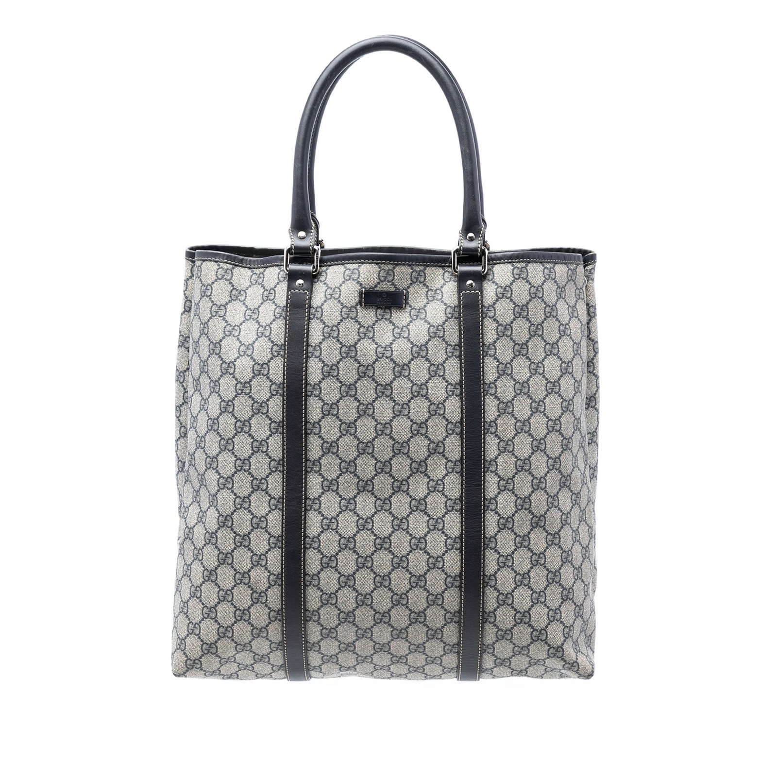 Gucci beige coated canvas vertical tote with leather trim: Gucci beige coated canvas vertical tote with leather trim This Gucci GG Supreme Joy Vertical Tote is crafted from coated canvas with leather trim and features rolled leather handles. The bag is design