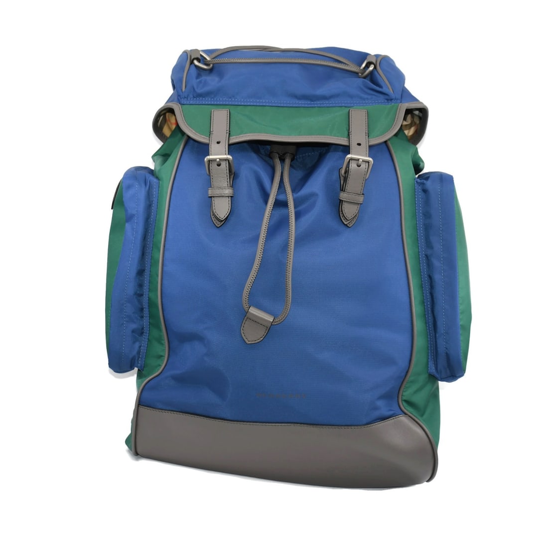 Burberry House Check Nylon Backpack with Dust Bag 20x12x8: Burberry House Check Nylon Backpack with Dust Bag 20x12x8 Discover the Burberry Nylon House Check Backpack, a stylish accessory featuring a classic checkered pattern in vibrant multicolor. This pre-ow