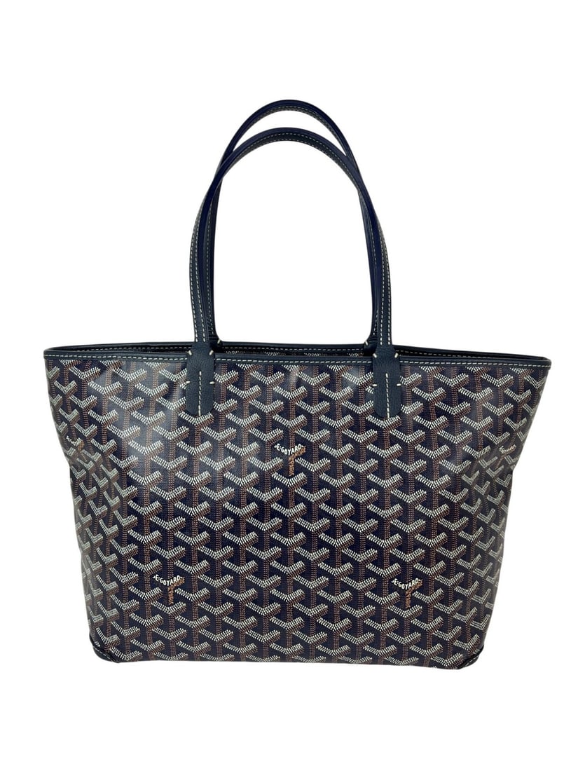 Goyard Artois PM Small Navy Goyardine Zip Tote: Goyard Artois PM Small Navy Goyardine Zip Tote Pre-owned Goyard Goyardine Artois PM tote bag in navy blue with a zip-top closure and double leather handles. This rectangular tote features the Goyard G