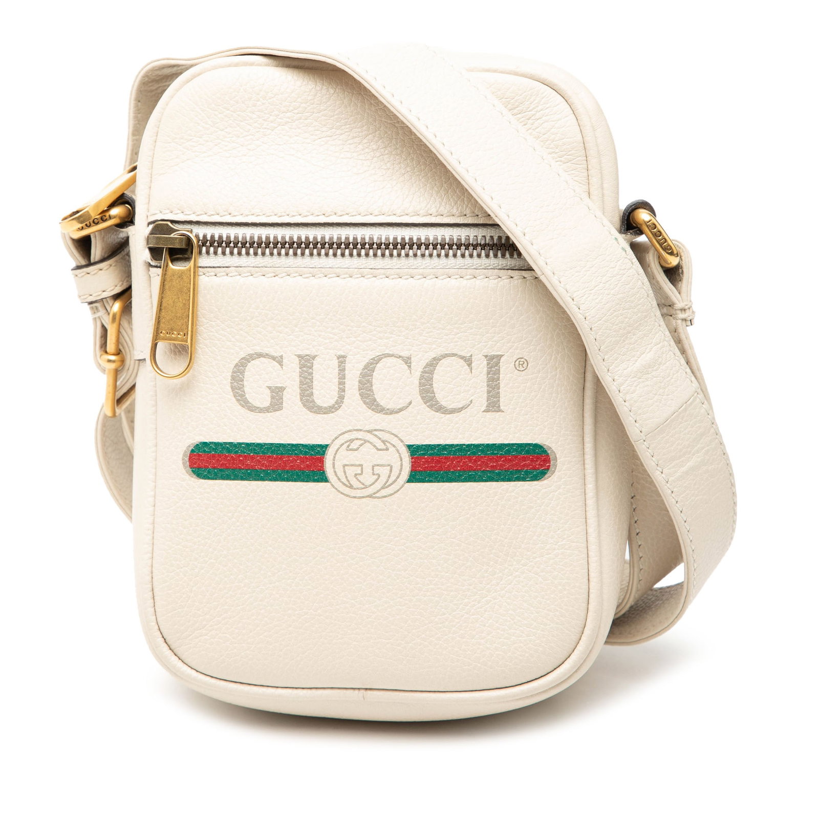 Gucci White Mini Leather Crossbody Bag with Logo and Zip Pocket: Gucci White Mini Leather Crossbody Bag with Logo and Zip Pocket This Gucci Mini Grained Calfskin Logo Crossbody bag is crafted from white leather and features a flat leather strap, an exterior front z