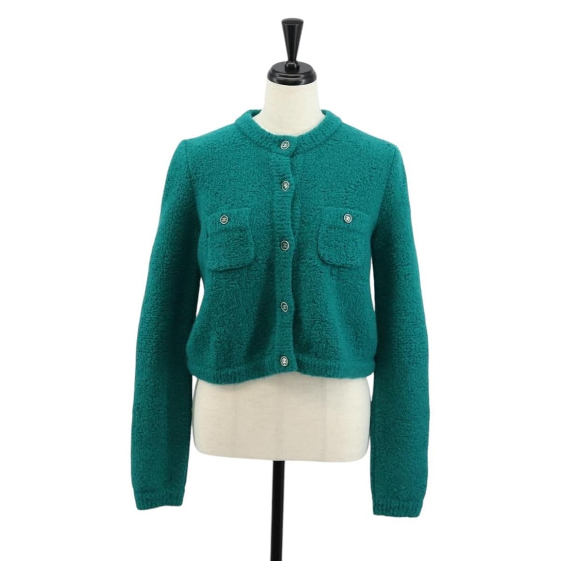 CHANEL Wool Tweed Jacket Green Silver CC Italy: CHANEL Wool Tweed Jacket Green Silver CC Italy A CHANEL tweed jacket in green and silver, made from wool and made in Italy. The jacket is size AB condition, with slight rubbing on the outside and insi