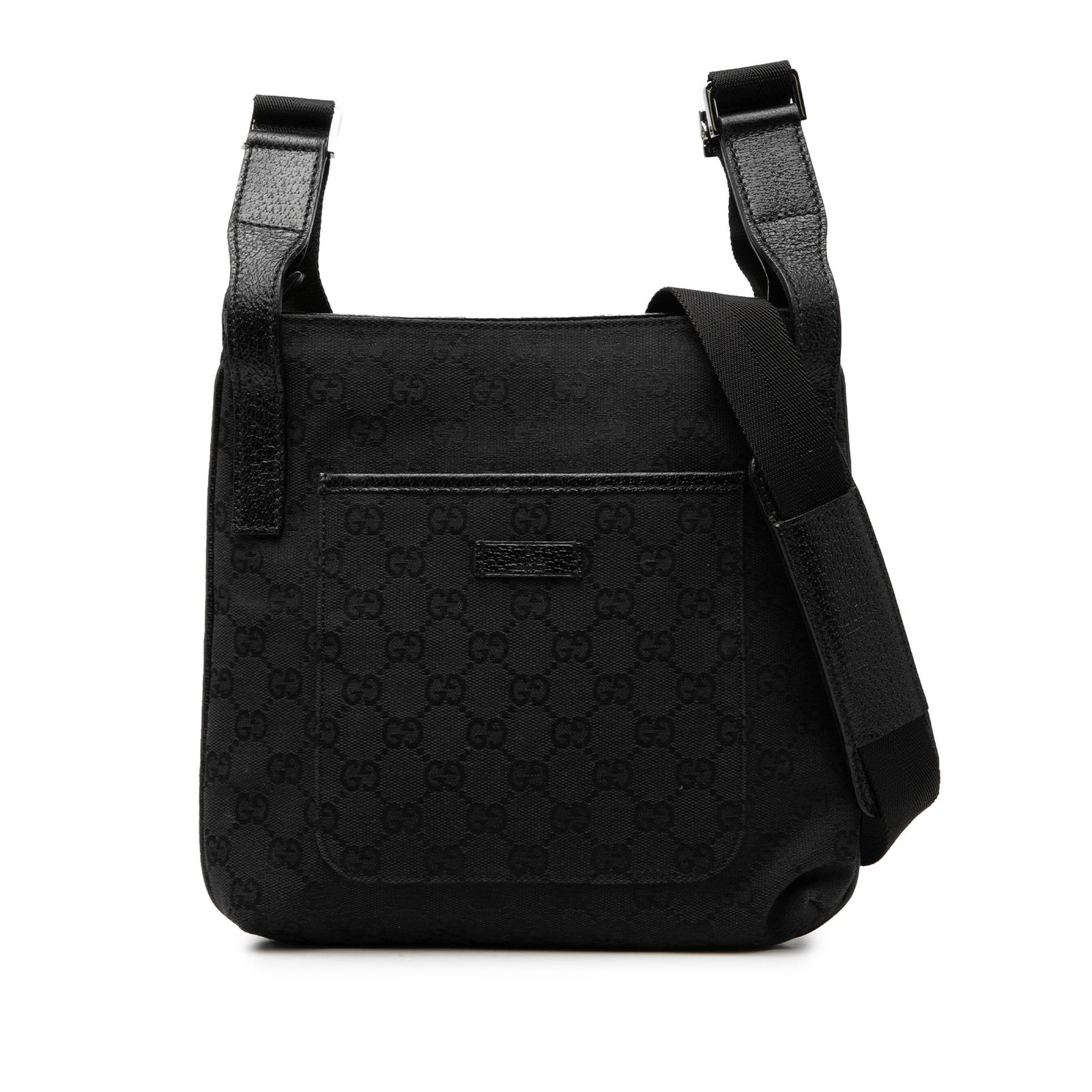 Black GG Canvas Crossbody Bag with Leather Trim by Gucci: Black GG Canvas Crossbody Bag with Leather Trim by Gucci This Gucci GG Canvas Crossbody bag features a black canvas body with leather trim, an adjustable flat strap, a top zip closure, an exterior fro