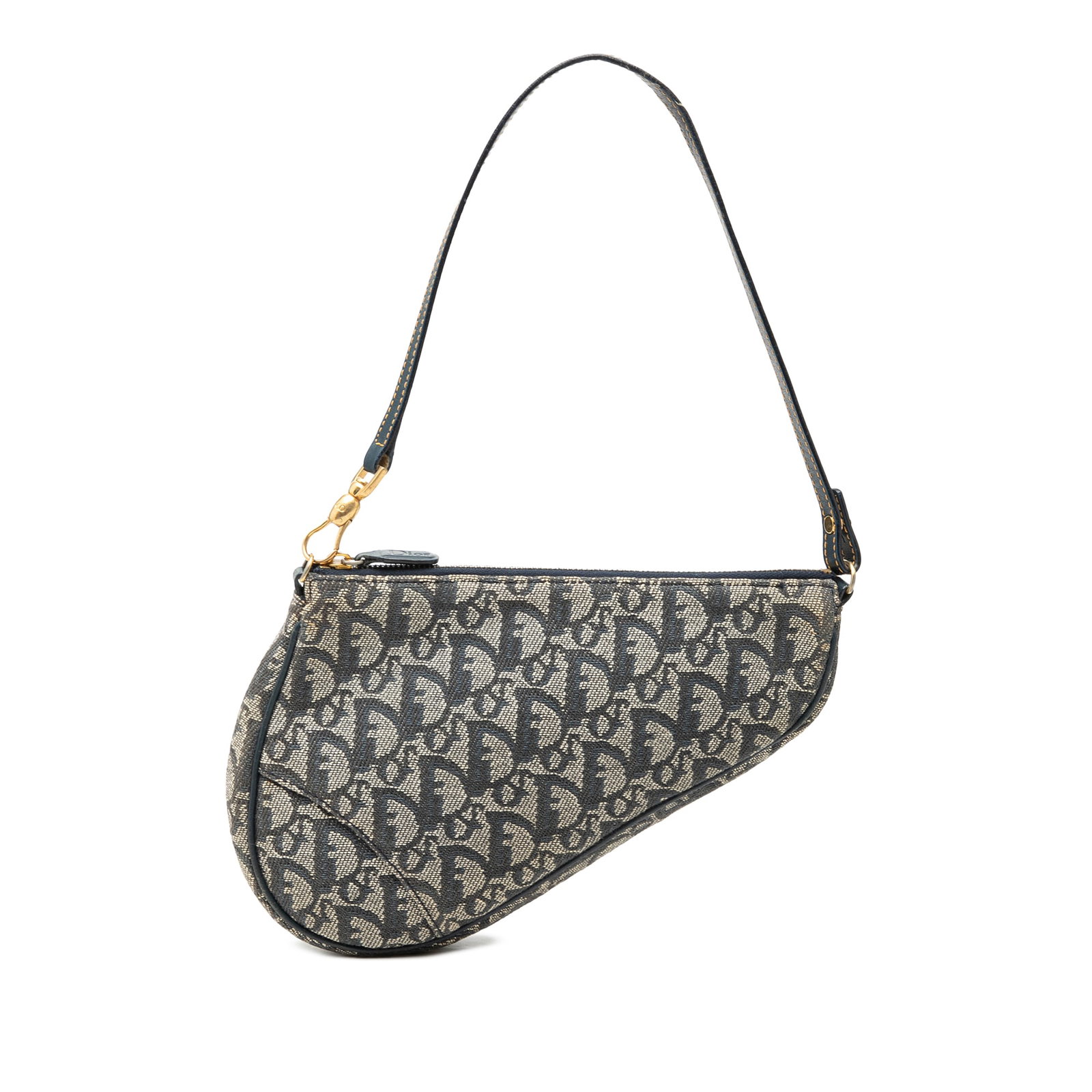 Dior Mini Diorissimo Saddle Pochette Blue Canvas Bag: Dior Mini Diorissimo Saddle Pochette Blue Canvas Bag Mini Diorissimo Canvas Saddle Pochette with a canvas body, flat leather handle, and top zip closure. This blue bag is made in Spain and shows visib