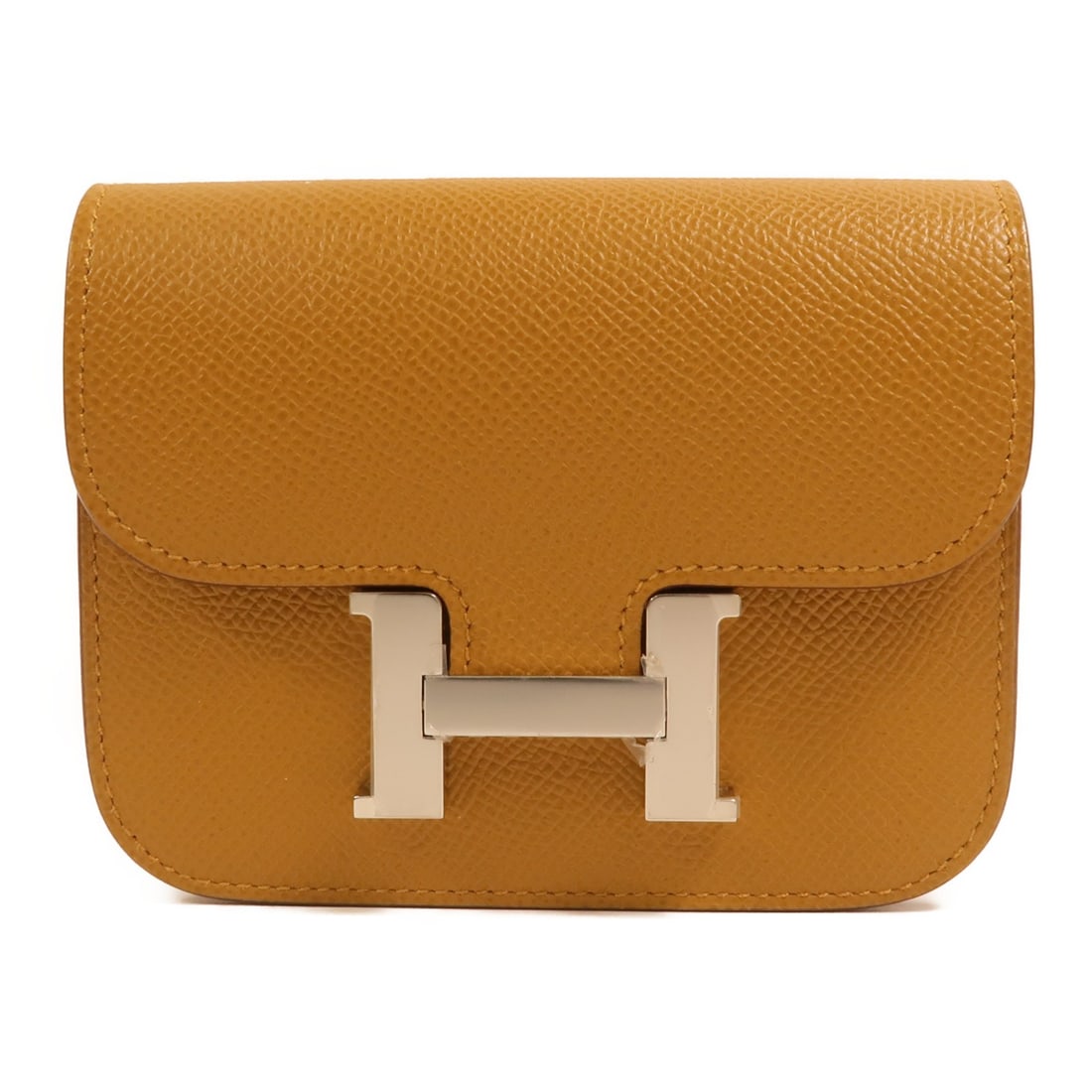 Hermes Constance Slim Bi Fold Wallet Epsom Calfskin Chai PHW: Hermes Constance Slim Bi Fold Wallet Epsom Calfskin Chai PHW Hermes Constance Slim bi-fold wallet in Epsom leather and calfskin (cowhide), presented in chai and brown. It features space for 2 cards, a