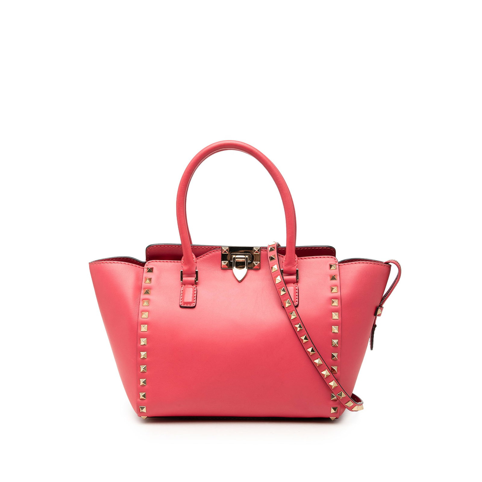 Valentino Rockstud Trapeze Small Pink Leather Satchel: Valentino Rockstud Trapeze Small Pink Leather Satchel Valentino Small Leather Rockstud Trapeze Satchel in pink leather with signature stud detailing. The bag features rolled leather handles, a detacha