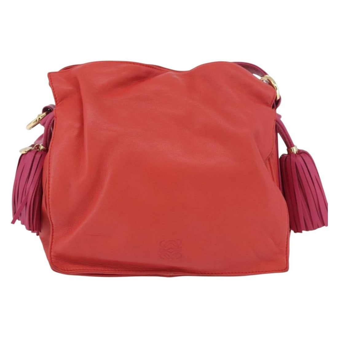 Orange Leather Flamenco Shoulder Bag by Loewe Spain: Orange Leather Flamenco Shoulder Bag by Loewe Spain This Loewe Flamenco Bag is crafted from orange leather and designed for women. It features metal fittings and an adjustable strap. The bag shows sur