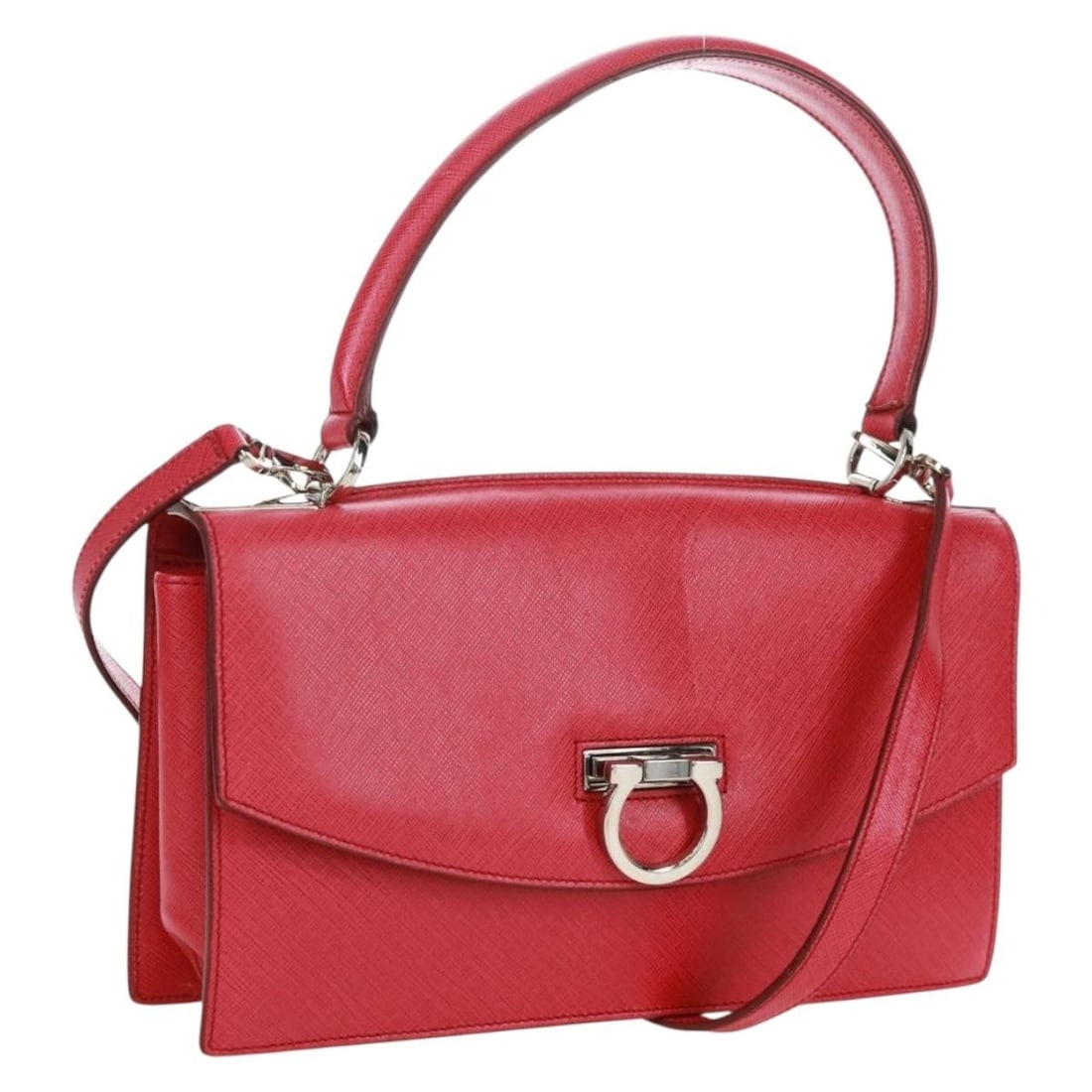 Salvatore Ferragamo Gancini Pink Silver Leather 2way Handbag: Salvatore Ferragamo Gancini Pink Silver Leather 2way Handbag This Salvatore Ferragamo Gancini handbag is crafted from pink and silver leather and offers versatile styling with both a top handle and a 