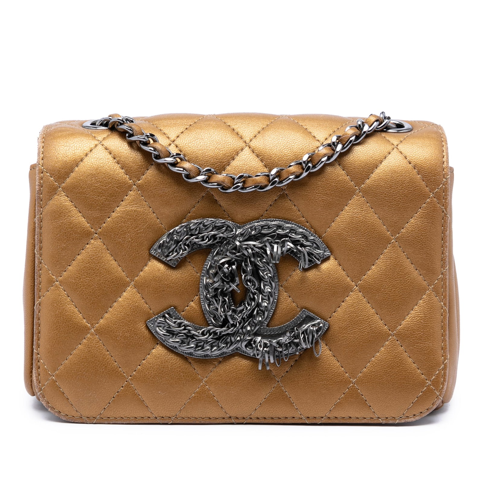 Chanel Mini Full Flap Crossbody Metallic Quilted Lambskin Fringe: Chanel Mini Full Flap Crossbody Metallic Quilted Lambskin Fringe This Chanel limited edition mini crossbody bag is crafted in quilted metallic lambskin leather with a leather-woven chain strap. It fea