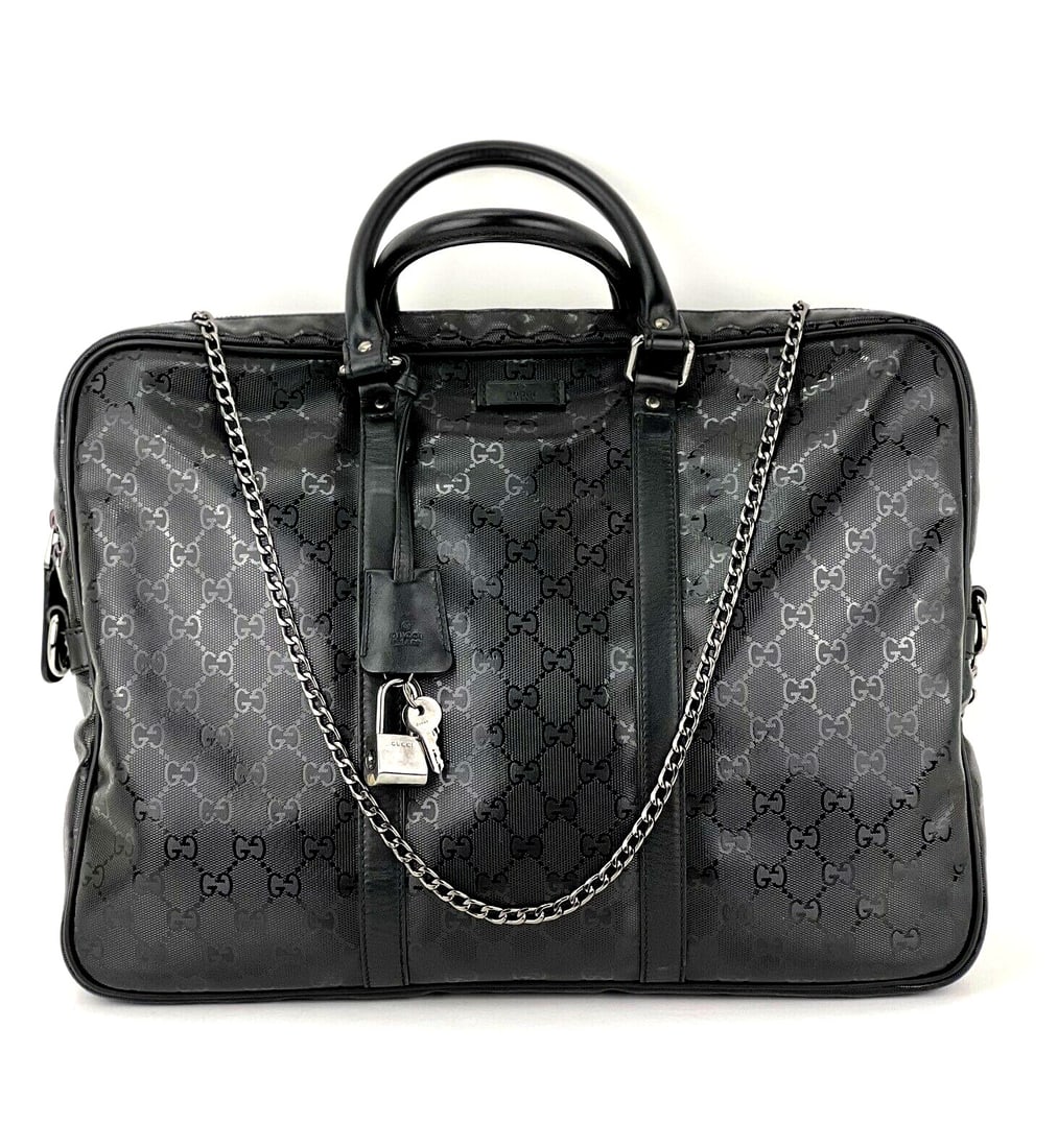 Gucci GG Imprime Black Canvas Briefcase with Detachable Strap: Gucci GG Imprime Black Canvas Briefcase with Detachable Strap Experience luxury with the Gucci GG Imprime Coated Canvas Black Monogram Briefcase Attache Bag. This stylish and functional medium-sized b