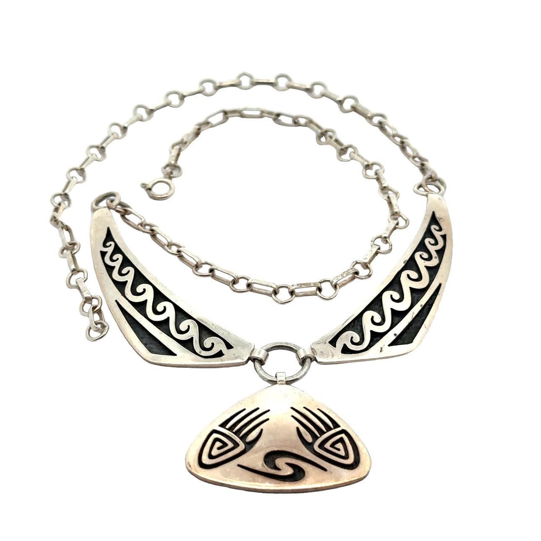 Unbranded Sterling Silver Hopi Bear Paw Pendant Necklace 20in: Unbranded Sterling Silver Hopi Bear Paw Pendant Necklace 20in This exquisite necklace features a Hopi Bear Paw triangular pendant crafted from .925 sterling silver, showcasing the artistry of Floyd Lo