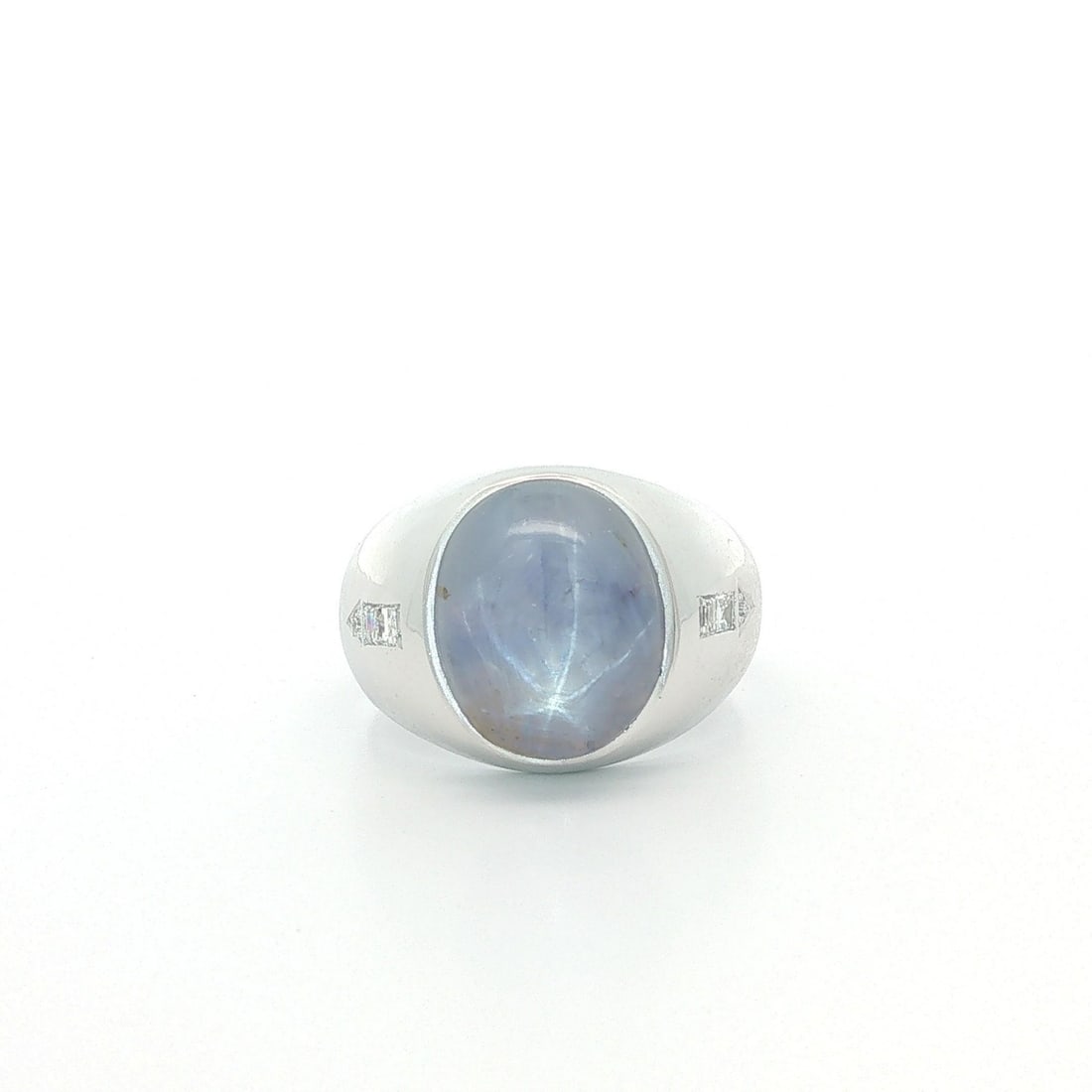 Mens Signet Ring in White Gold with Star Sapphire and Diamond Accents: Mens Signet Ring in White Gold with Star Sapphire and Diamond Accents Pre-owned men's signet ring featuring a natural grayish blue oval cabochon star sapphire in a bezel setting, accented by diamonds 