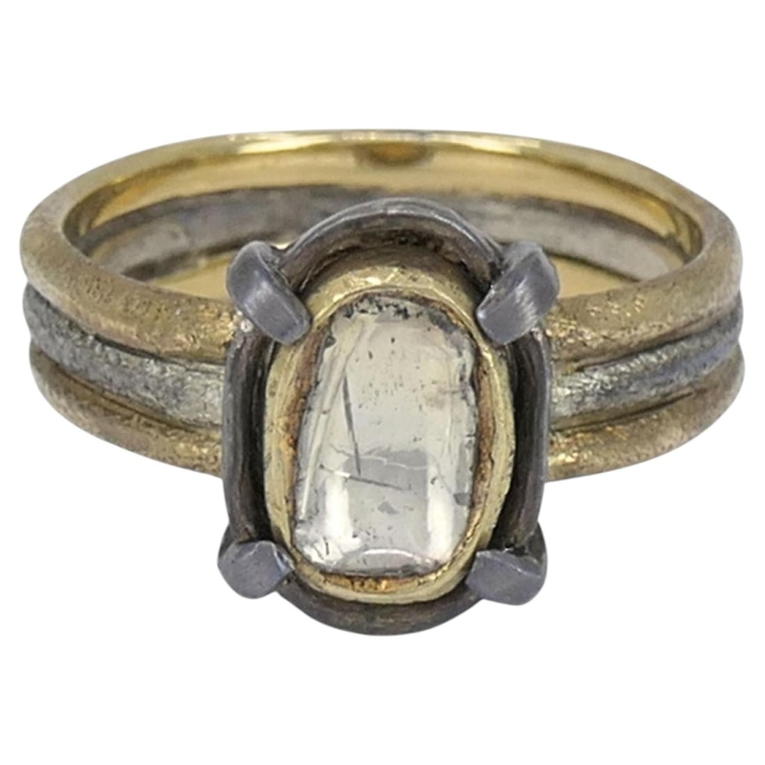 Mixed Metal Portrait Cut Diamond Ring in 14k Yellow and 10k White Gold: Mixed Metal Portrait Cut Diamond Ring in 14k Yellow and 10k White Gold Antique mixed metal ring set with a portrait cut diamond. The design features a tested 14k yellow gold body with 10k white gold a