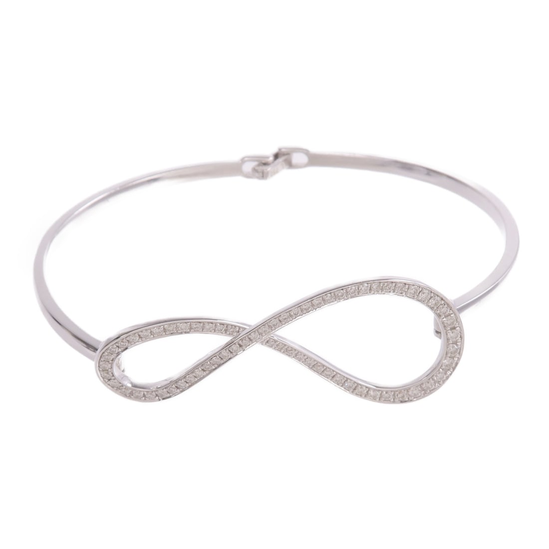 18K White Gold Diamond Bracelet for Women: 18K White Gold Diamond Bracelet for Women Diamond bracelet in K18WG white gold with diamond accents. Designed for women, this bracelet features a clear color presentation and a regular size type. It i