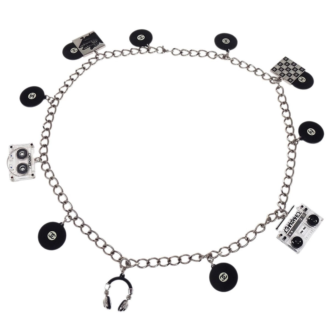 Chanel 04P silver chain belt with cassette motif rhinestones: Chanel 04P silver chain belt with cassette motif rhinestones Chanel chain belt in silver with rhinestone detailing. The belt is listed as one size for women and was made in Japan. Condition is noted a