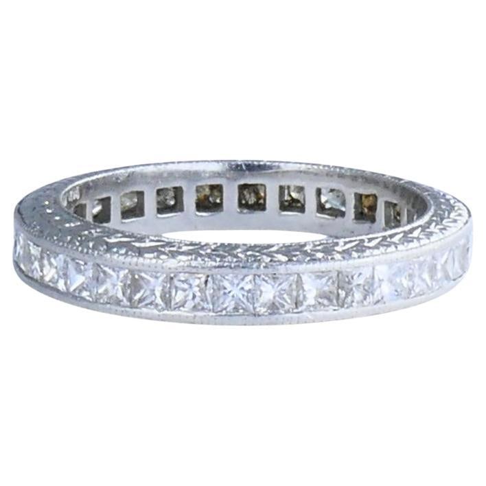Platinum Diamond Eternity Band Ring by Michael Beaudry Size 6: Platinum Diamond Eternity Band Ring by Michael Beaudry Size 6 A platinum Michael Beaudry eternity band in size 6, set with a continuous row of princess cut diamonds in a channel setting. The band feat