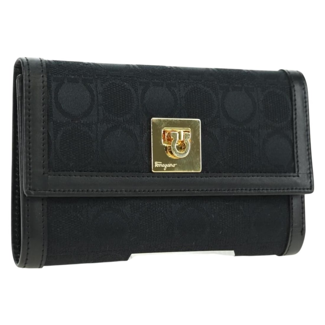 Black Canvas Trifold Wallet Salvatore Ferragamo Gancini Italy: Black Canvas Trifold Wallet Salvatore Ferragamo Gancini Italy Salvatore Ferragamo Gancini trifold wallet in black canvas with gold-tone accents. Made in Italy, this women's wallet includes the item bo