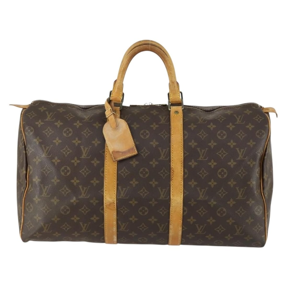 Keepall Monogram Canvas Travel Bag by Louis Vuitton Brown 50cm: Keepall Monogram Canvas Travel Bag by Louis Vuitton Brown 50cm This Louis Vuitton Keepall bag features the iconic monogram canvas in brown and is designed for unisex use. Made in France, the bag shows
