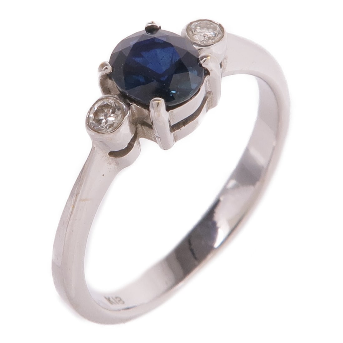 18K White Gold Sapphire Diamond Ring Size 6.25: 18K White Gold Sapphire Diamond Ring Size 6.25 A women's ring featuring sapphire and diamond accents in 18K white gold. The ring is size 6.25 and has a blue and clear color presentation. Condition is 