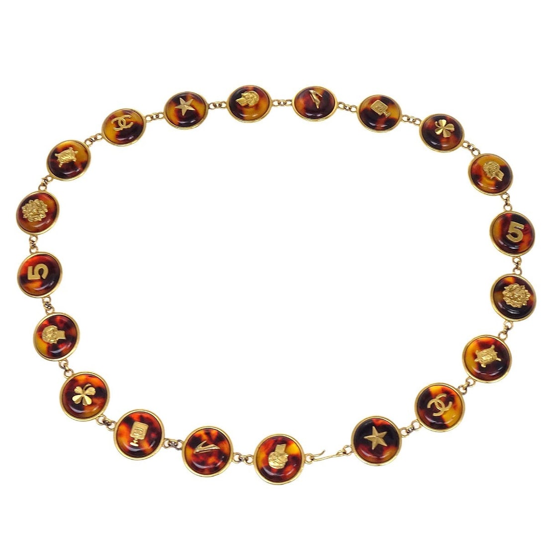 Chanel Gold Plated Adjustable Medallion Chain Belt: Chanel Gold Plated Adjustable Medallion Chain Belt This Chanel Medallion Charm Chain Belt features artificial tortoiseshell accents and gold-plated hardware. Designed for women, the adjustable chain s