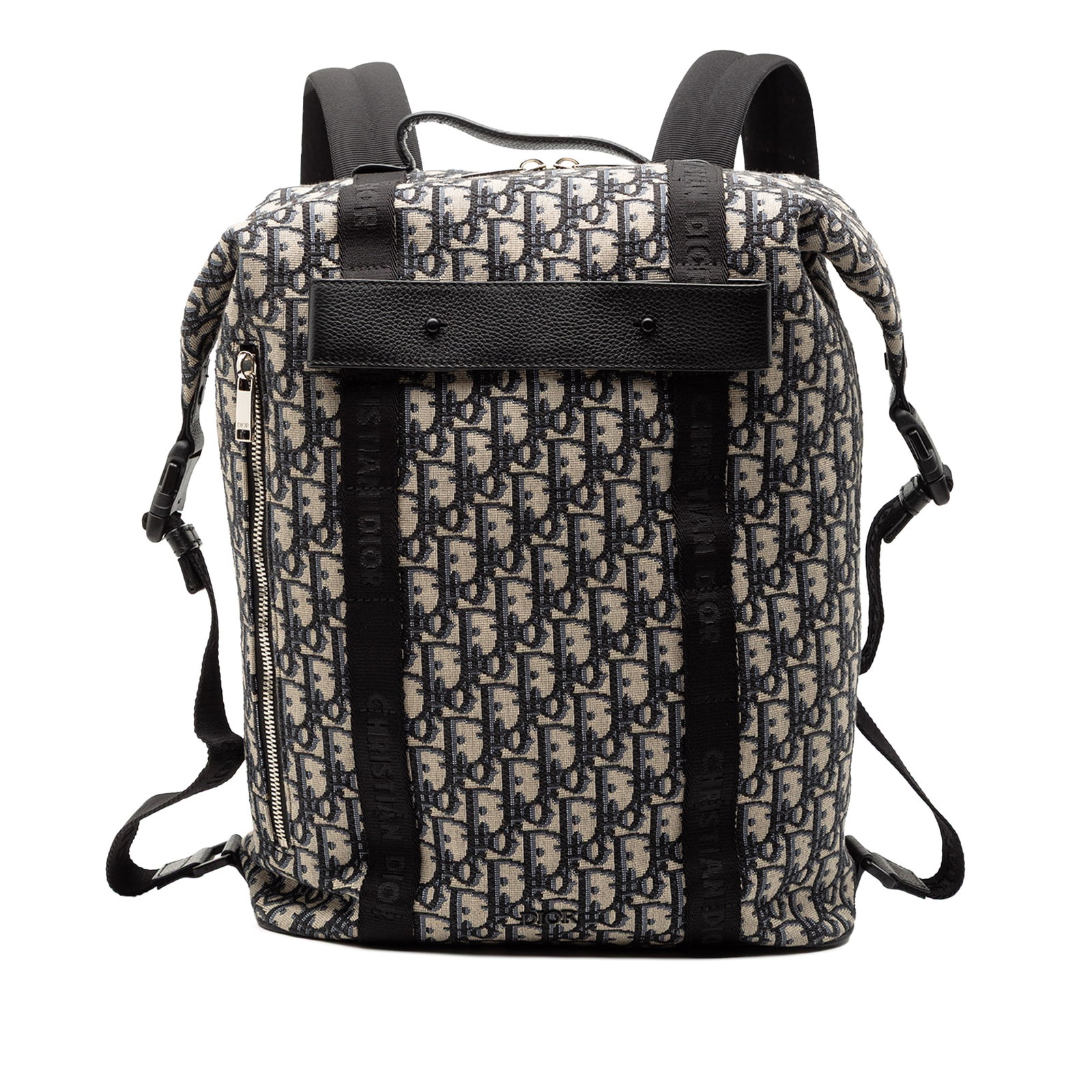 Oblique Canvas Safari Backpack by Dior in Blue Fabric: Oblique Canvas Safari Backpack by Dior in Blue Fabric This Dior Oblique Canvas Safari Backpack features a durable blue canvas body with a flat top handle and adjustable back straps. It is designed wit