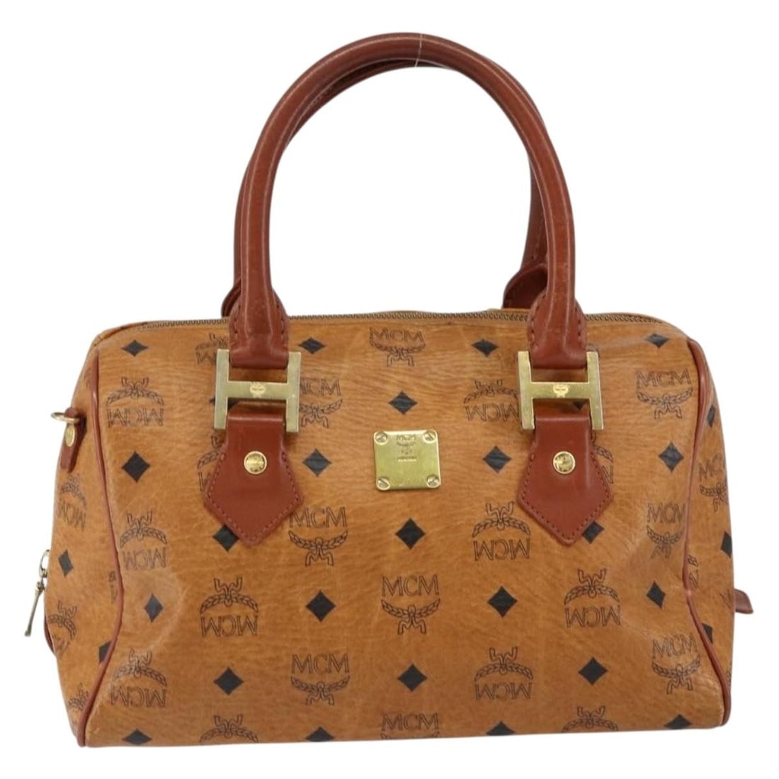 Brown Canvas and Leather MCM Visetos Logogramme Shoulder Bag: Brown Canvas and Leather MCM Visetos Logogramme Shoulder Bag This pre-owned MCM Visetos logogramme handbag is crafted from brown canvas with leather details. Designed for women, it features a compact 