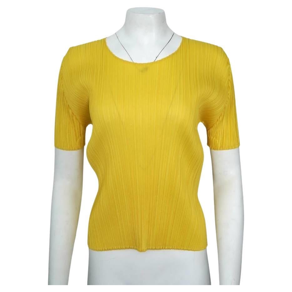 Yellow Pleated Top by Issey Miyake Pleats Please: Yellow Pleated Top by Issey Miyake Pleats Please Yellow Pleats Please pleated top by Issey Miyake, marked One Size. Made in Japan and dating to the 21st century, this top is described as being in exce