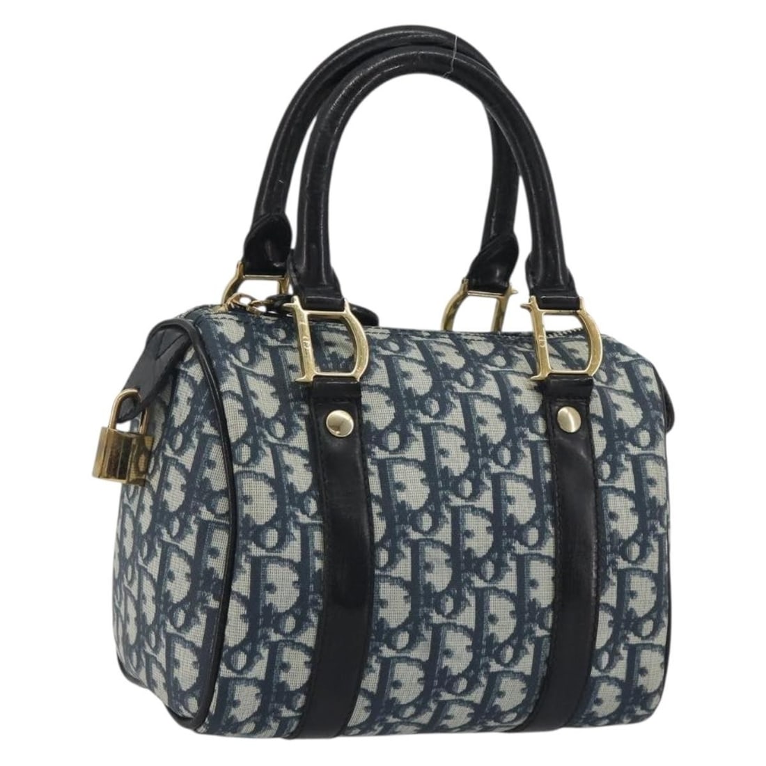 Christian Dior Trotter Navy PVC Leather Handbag Italy: Christian Dior Trotter Navy PVC Leather Handbag Italy Christian Dior Trotter canvas hand bag in navy with gold-tone accents. This women's bag is made in Italy and features PVC leather construction. It