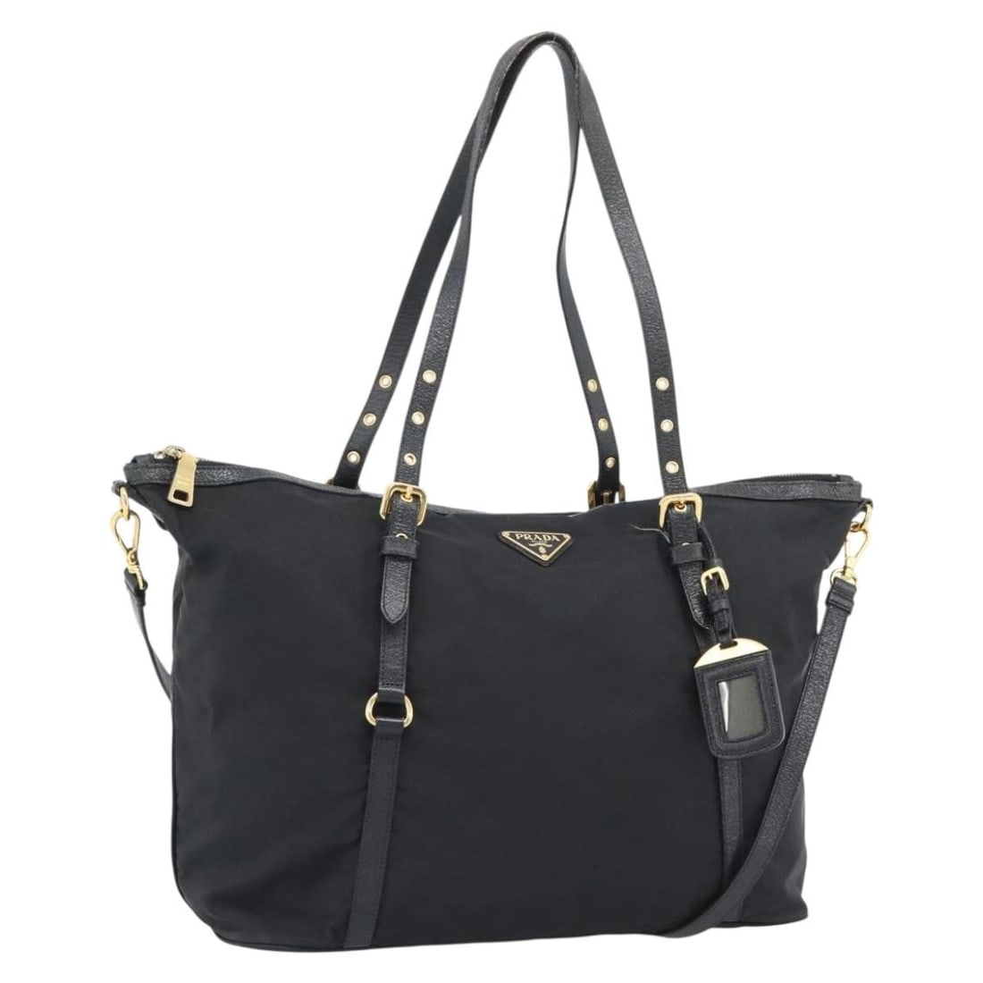 PRADA black nylon 2way tote bag with shoulder strap and name tag: PRADA black nylon 2way tote bag with shoulder strap and name tag Prada 2-way tote bag in black nylon with gold-tone accents. This women's bag includes a name tag and shoulder strap, and it was made in