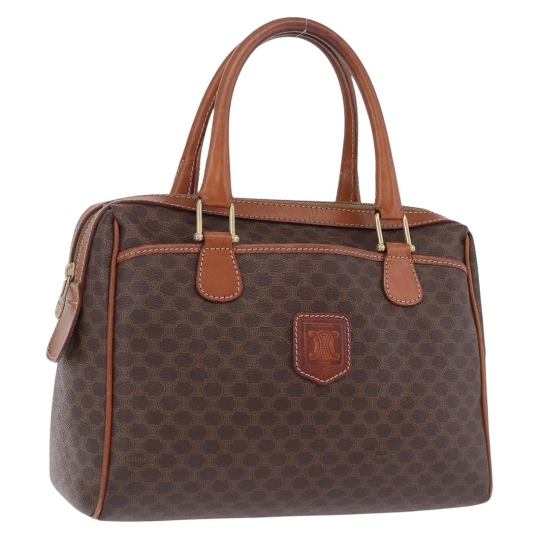CELINE Macadam Canvas Hand Bag Brown PVC Leather Gold Tone: CELINE Macadam Canvas Hand Bag Brown PVC Leather Gold Tone Celine Macadam canvas hand bag in brown with gold-tone accents, crafted with PVC leather trim. Made in Italy, this women's handbag is offered