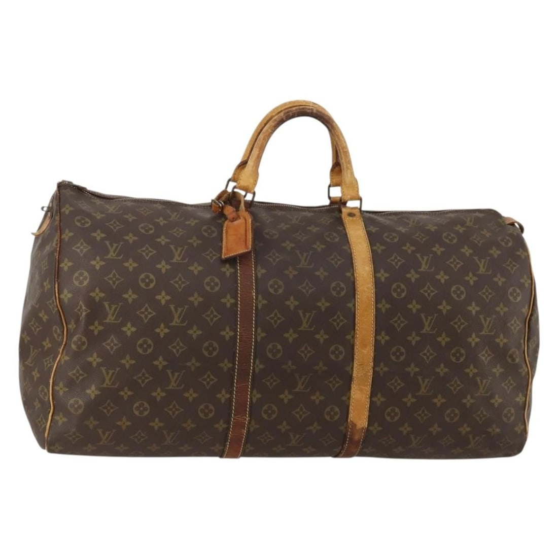 Louis Vuitton M41422 Keepall 60 Monogram Canvas Boston Bag: Louis Vuitton M41422 Keepall 60 Monogram Canvas Boston Bag Louis Vuitton Keepall 60 Boston bag in Monogram canvas with a name tag. This made-in-France bag is a heavily used older model and shows signi