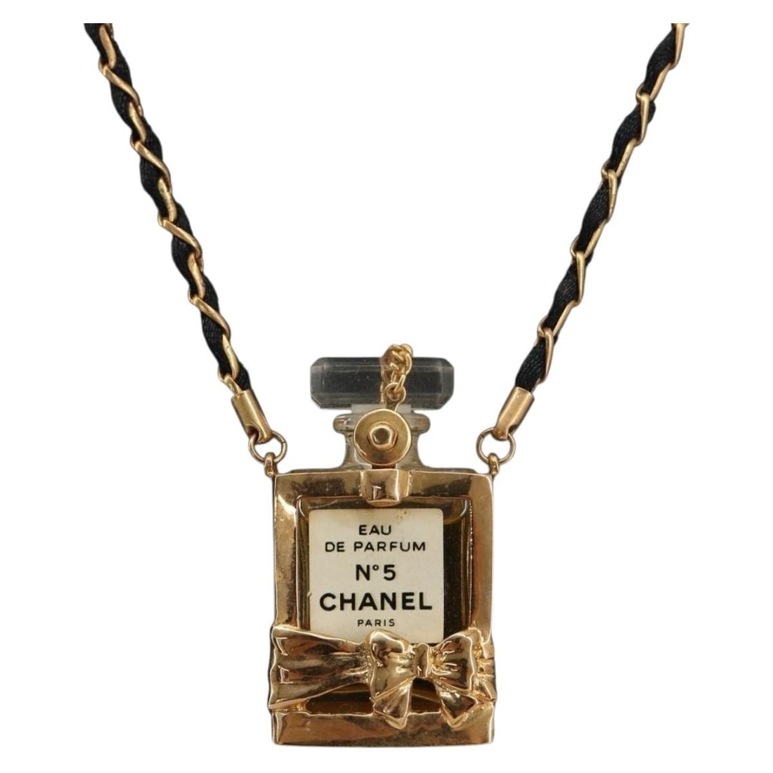 CHANEL CC Perfume Pendant Necklace Gold Tone Black Metal: CHANEL CC Perfume Pendant Necklace Gold Tone Black Metal CHANEL women's perfume necklace in gold tone and black metal. This heavily used piece shows visible wear from prior use, including rubbing, sli