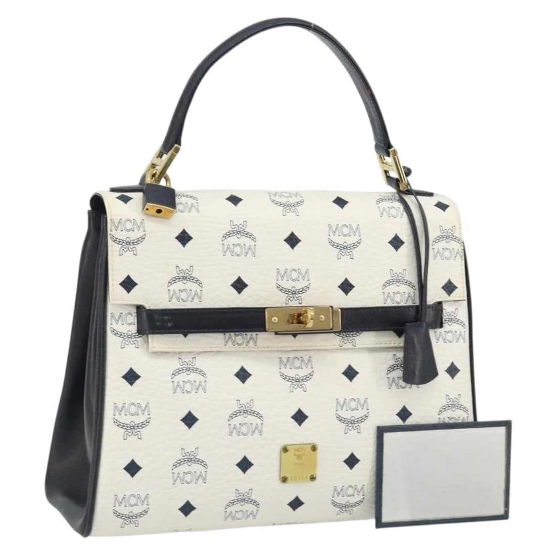 MCM White Gold PVC Leather Hand Bag with Padlock Mirror: MCM White Gold PVC Leather Hand Bag with Padlock Mirror Authentic MCM Vicetos logogram handbag in white and gold PVC leather. This women's handbag includes a padlock, two keys, a clochette, and a mirr