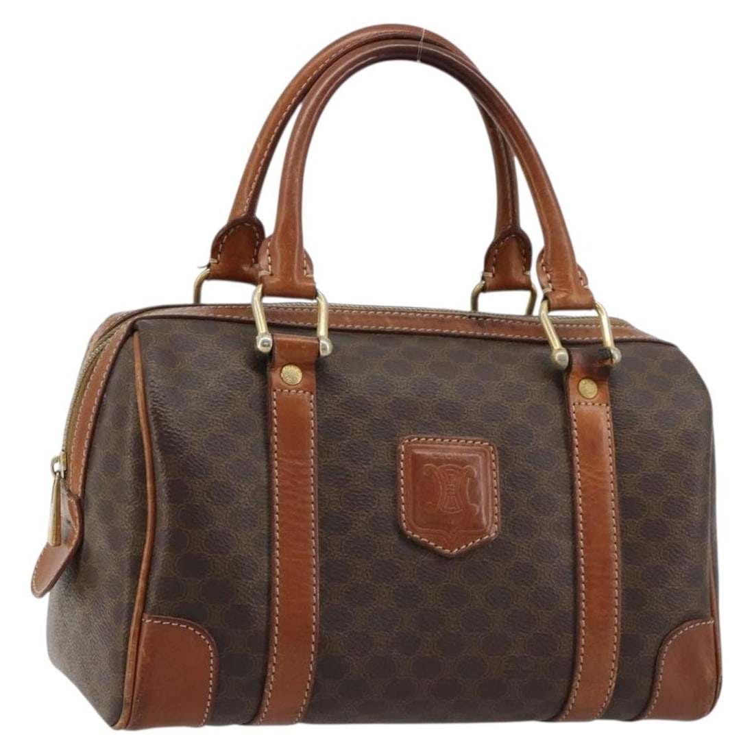 CELINE Macadam Boston Bag Brown PVC Leather Italy: CELINE Macadam Boston Bag Brown PVC Leather Italy Celine Boston bag in brown Macadam canvas with PVC leather trim and gold-tone accents. Made in Italy, this women's handbag is offered without the orig