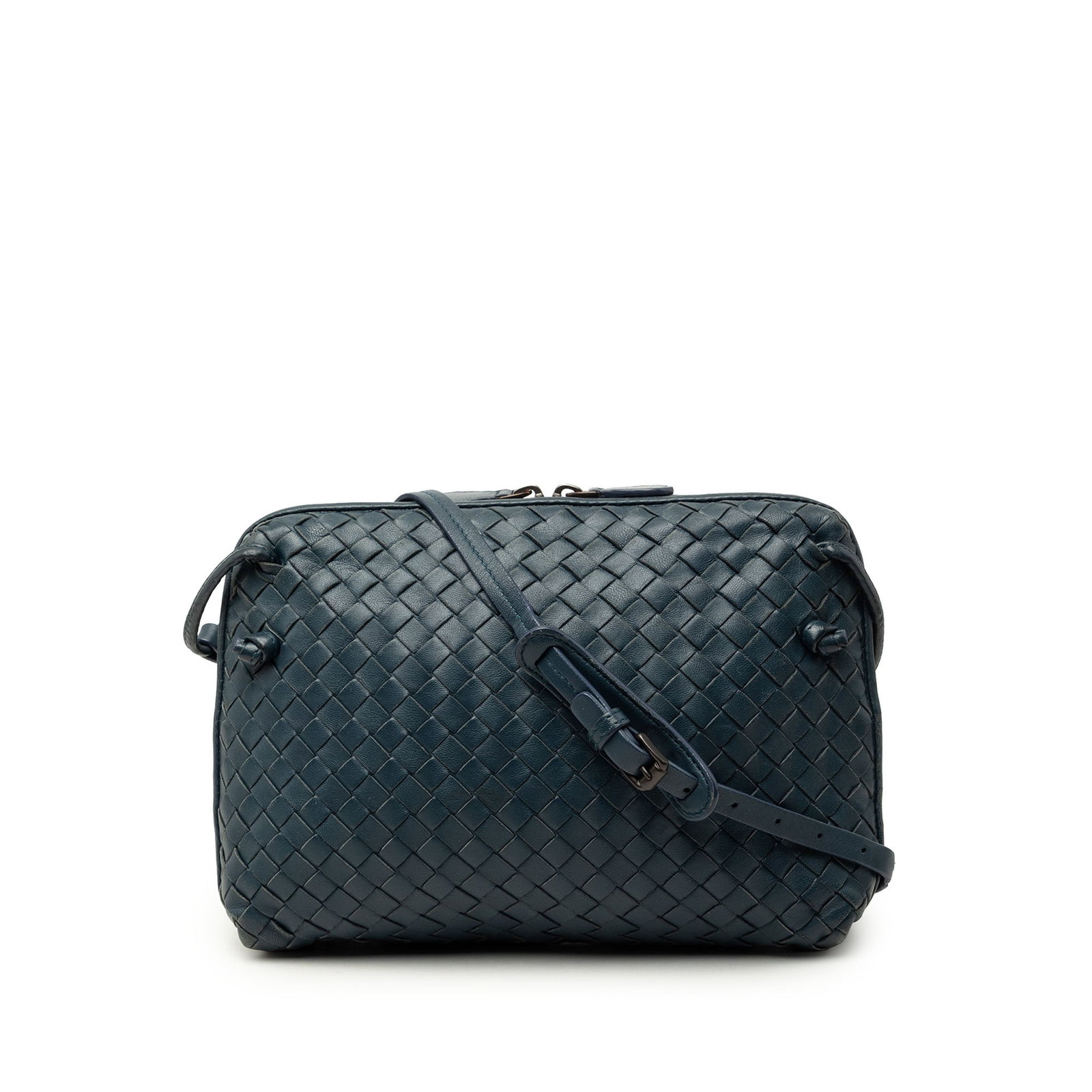 Blue Leather Crossbody Bottega Veneta Nodini Intrecciato: Blue Leather Crossbody Bottega Veneta Nodini Intrecciato Bottega Veneta Nodini crossbody bag crafted in blue woven leather with the brand's Intrecciato design. This crossbody features a flat leather s