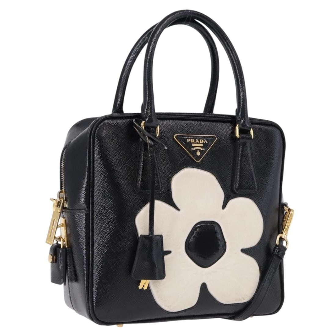 PRADA Saffiano Leather 2 Way Handbag Black with Gold Tone Hardware: PRADA Saffiano Leather 2 Way Handbag Black with Gold Tone Hardware PRADA hand bag in Saffiano leather with a black and gold tone finish. It is a 2-way style made in Italy and comes with a padlock, two