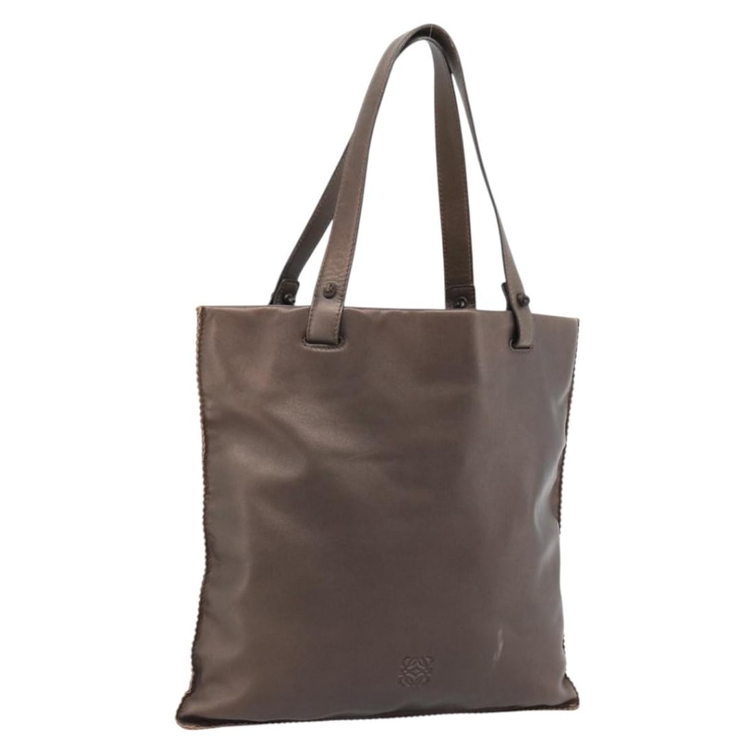 LOEWE Bronze Leather Tote Bag for Women Made in Spain: LOEWE Bronze Leather Tote Bag for Women Made in Spain Authentic LOEWE tote bag in bronze leather, made in Spain. This women's bag features a structured tote silhouette with a spacious interior. Please