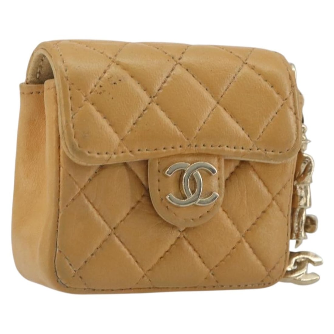 CHANEL Charm Matelasse Lamb Skin CC Gold Beige France: CHANEL Charm Matelasse Lamb Skin CC Gold Beige France CHANEL Matelasse charm in lamb skin with a gold and beige colorway. Made in France for women, this piece shows heavy use and wear throughout. Plea