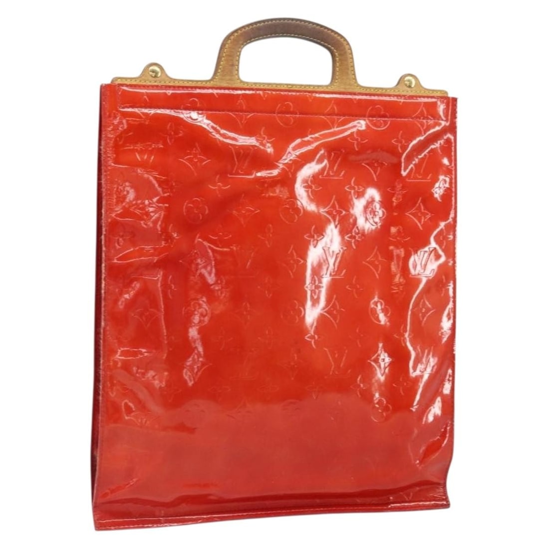 Red Monogram Vernis Stanton Patent Tote by Louis Vuitton M91078: Red Monogram Vernis Stanton Patent Tote by Louis Vuitton M91078 This is a Louis Vuitton Monogram Vernis Stanton tote bag crafted from red patent leather. The bag features a spacious design suitable fo