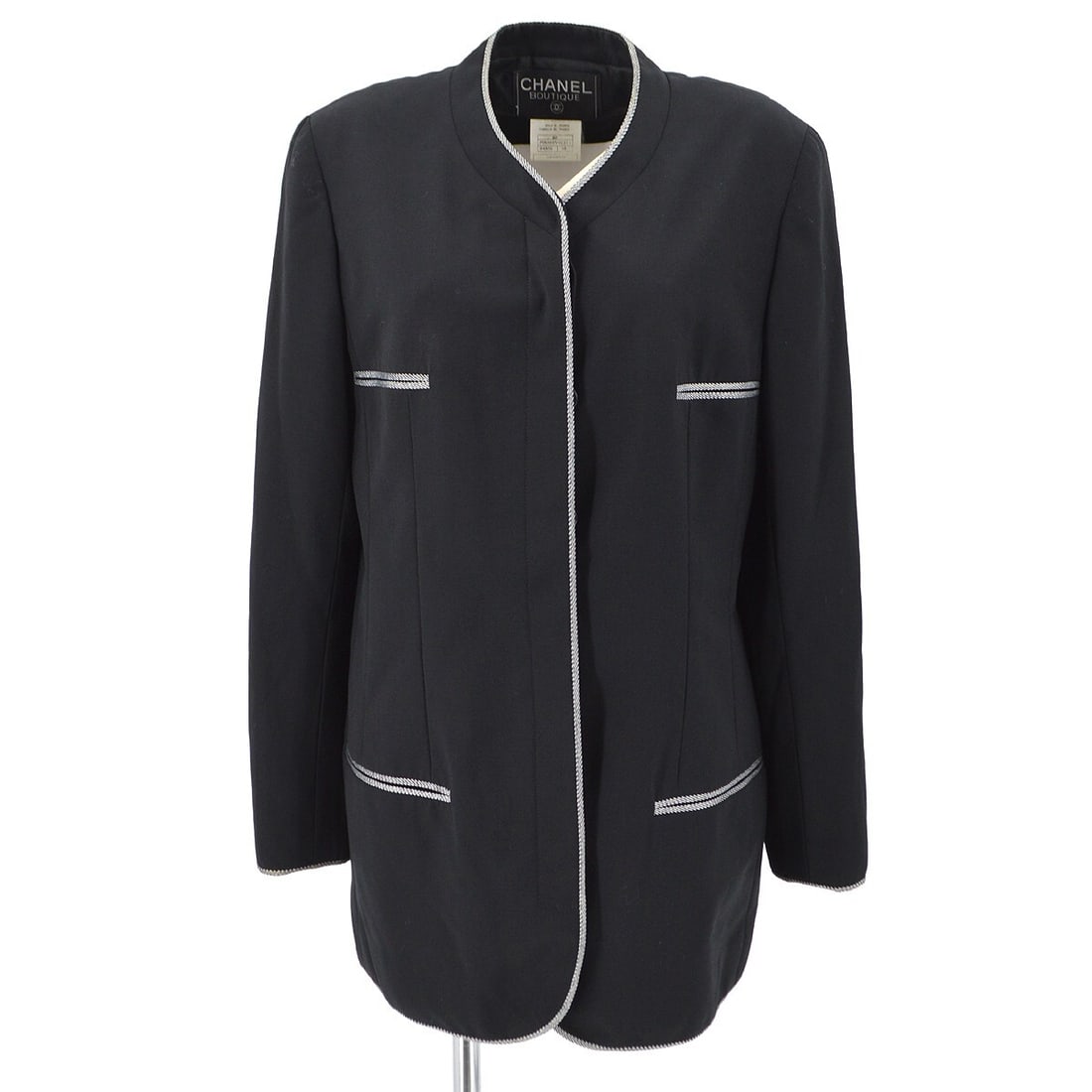 Vintage CHANEL black wool collared jacket size 38 France: Vintage CHANEL black wool collared jacket size 38 France Vintage Chanel black mid-length jacket in 100% wool with a collared neckline, long sleeves, and button-front closure. Designed in a regular fit
