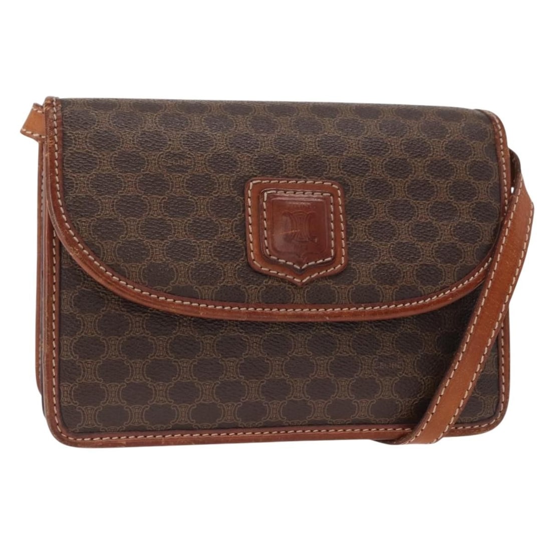 CELINE Macadam Canvas Brown Gold Shoulder Bag Italy: CELINE Macadam Canvas Brown Gold Shoulder Bag Italy This CELINE Macadam shoulder bag is crafted from brown and gold PVC leather and Macadam canvas, offering a classic and recognizable design. Made in 